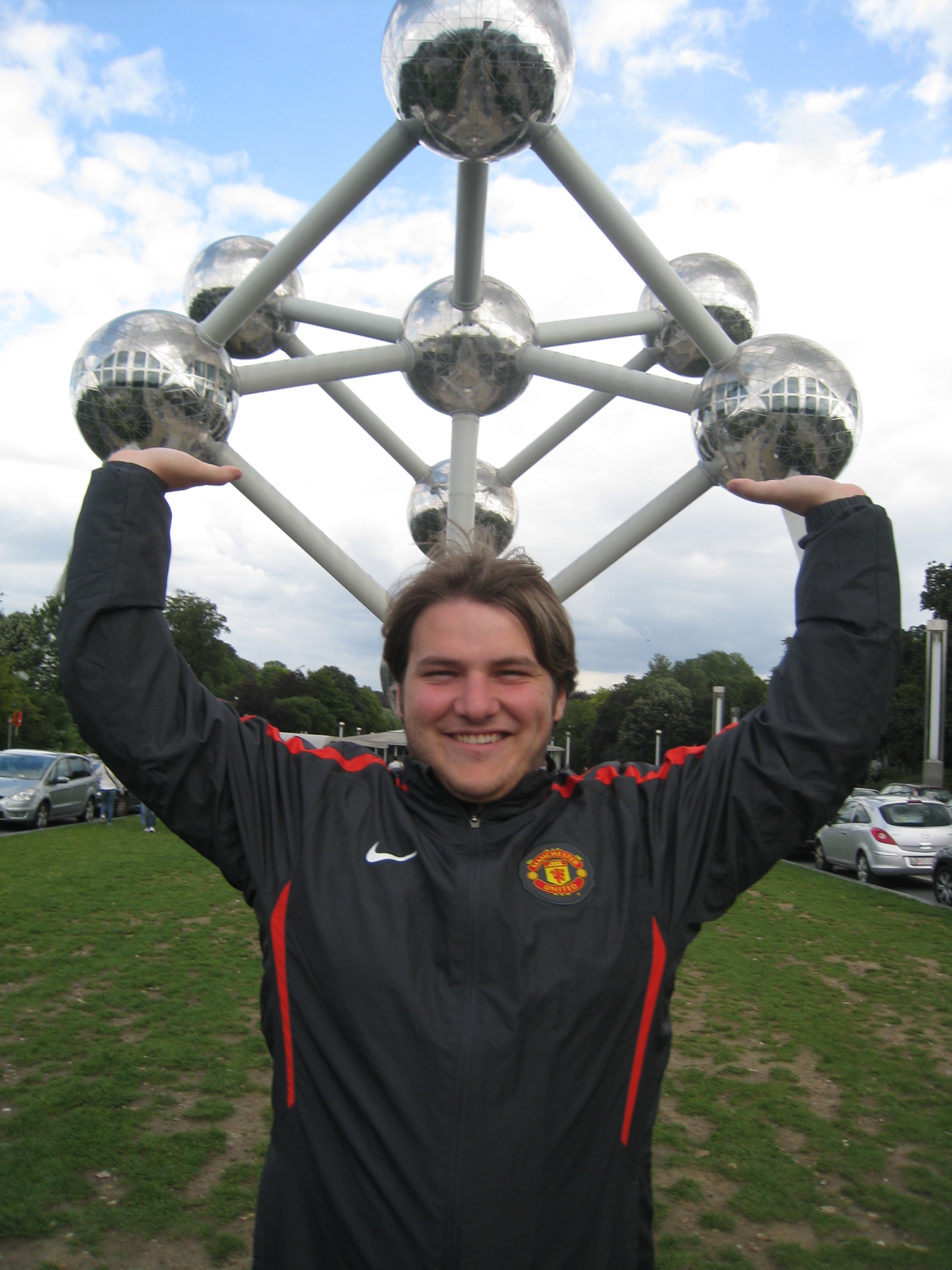 Ben holds up the Atomium
